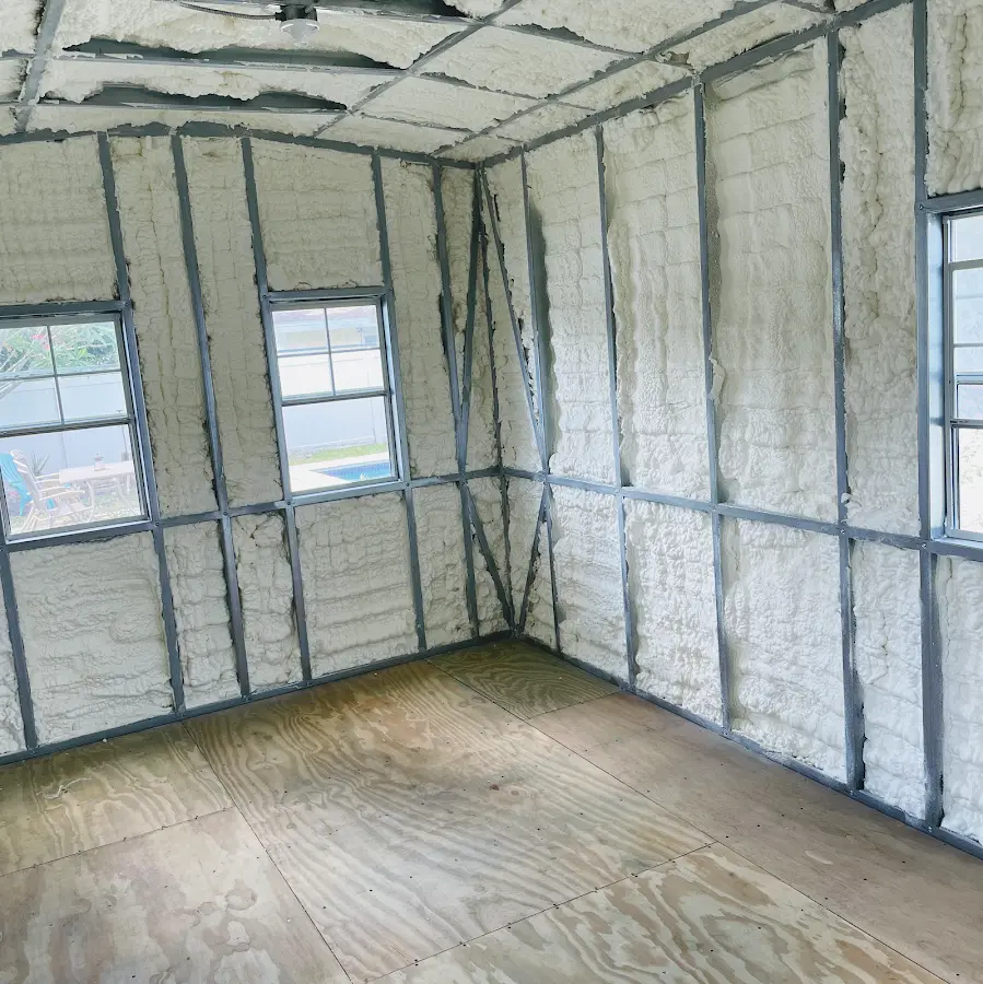 Closed-cell spray foam insulation applied to wall cavities in a residential project in Ripley